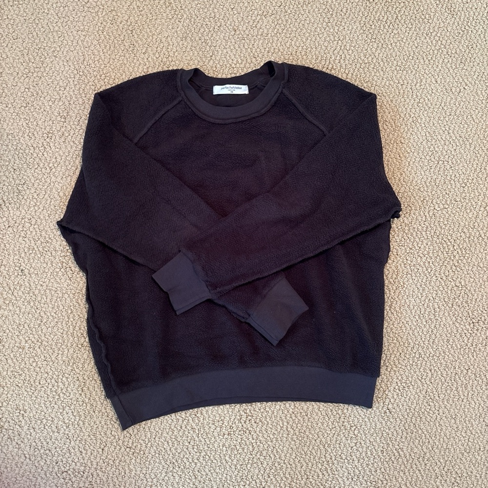 Black crewneck sweater